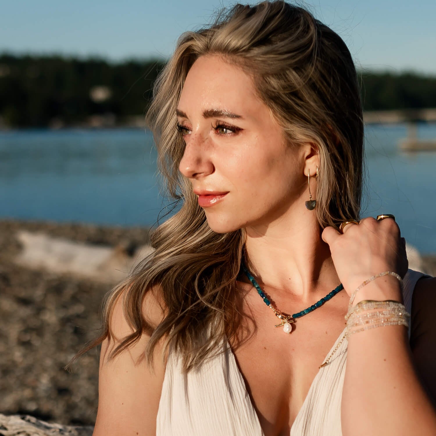 Beautiful Necklace for beautiful woman wearing a stunning blue beaded necklace gemstone apatite with water-friendly and hypoallergenic gold toggle clasp + removeable pearl charm