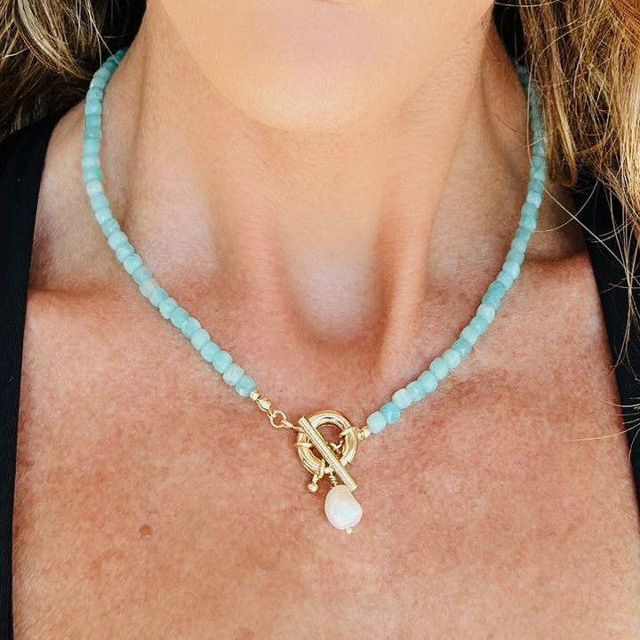 model wearing amazonite necklace with faceted cubes and removable pearl pendant gold