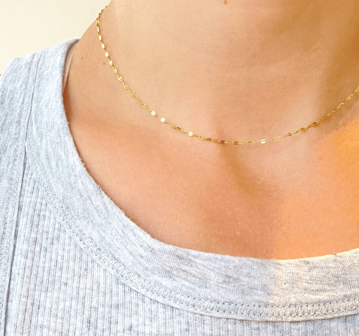 Pretty Gold Necklace on a model 