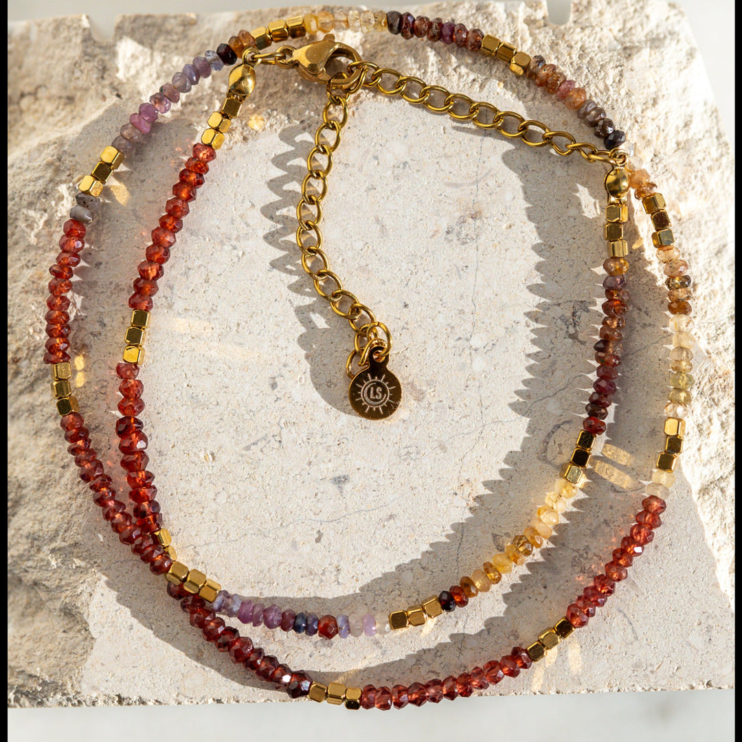 Close view of multicolor sapphire stones in autumn shades of brown, yellow and orange